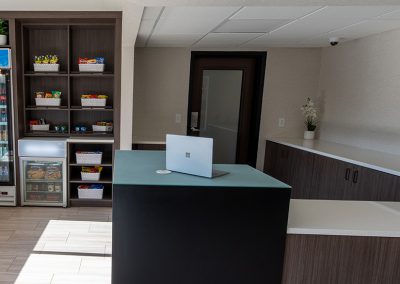 Front desk area of Superior Stay Hotel in Marquette