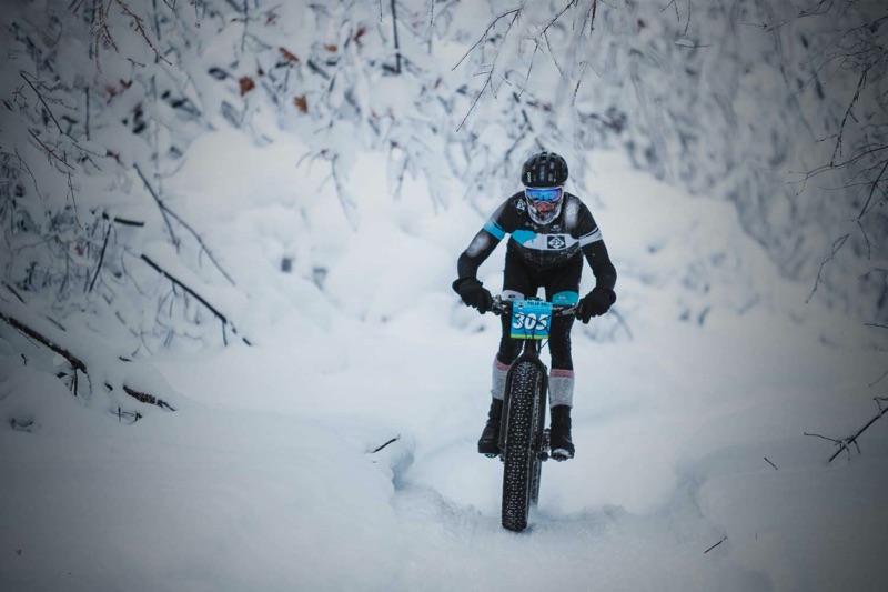 person on bike on snow