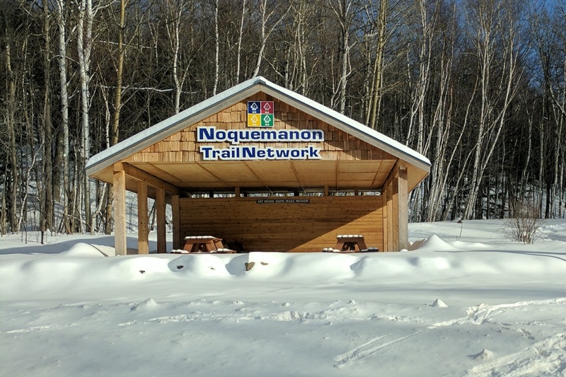 A wooden hut in snow