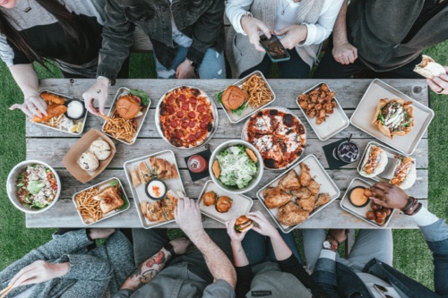 Business travellers eating at restaurant